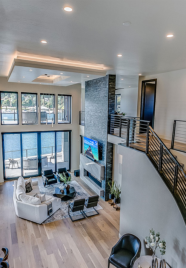 Large two story open floorplan with curved staircase to top floor