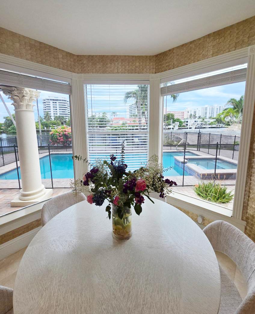 Interior view of elegant custom bay window overlooking waterfront